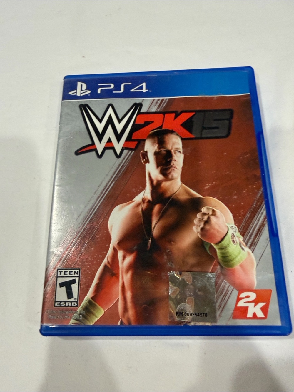 Sony PS4 WWE 2K15 Video Game - Blue Case with Red Cover Art